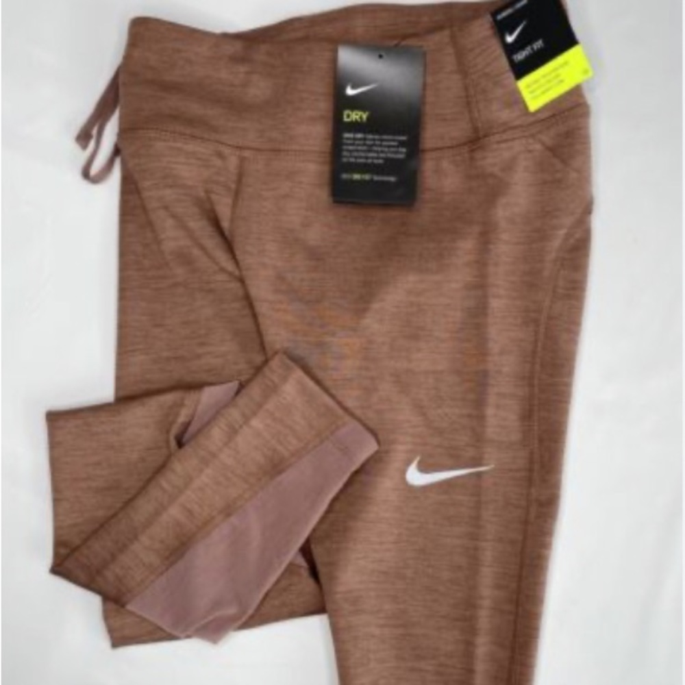 Womens mid rise NIKE running leggings with back zipper for phone/wallet/keys.